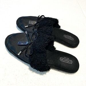 Coach black slip on  size 5.5